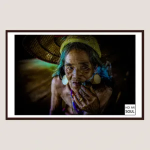 “smoking pipe” photograph, portrait photo of a woman from an ethnic minority, with realistic, strong, and vivid features