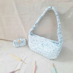 blue craft shoulder bag, thick woven fabric material, trendy style, unique light blue and white color tone