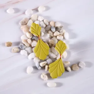 sabrina clay earrings, fan-shaped design with vein patterns, feminine and delicate style, pairs well with various outfits