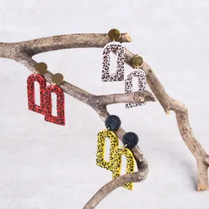 cow printed, window shaped clay earrings, unique and eye-catching design, personalized fashion accessory, facial highlight