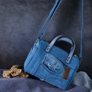 denim drum bag from recycled jeans, size 20, compact size, wide strap, sturdy buckle, suitable for daily use