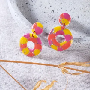 circle of life clay earrings, each color segment is pieced together with shimmering metallic edges, meaningful gift for friends
