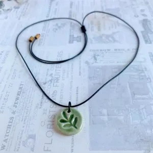 small leaf ceramic necklace, shiny glazed ceramic material, fresh and cool green color, simple and natural style, gift for nature lovers