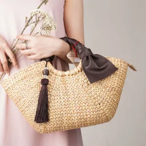 túi lục bình meraki quai quấn da bò, chiếc quai da nâu kèm tua rua nổi bật, phong cách trẻ trung và hiện đại, quà tặng tinh tế cho bạn gái