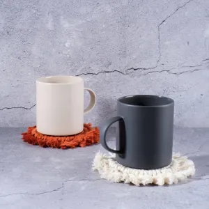 tassel yarn coaster, unique design, rustic style, subtle color palette, excellent absorbency, minimizes lint, handmade product