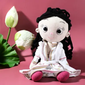 hana wearing ethnic clothes fabric doll, patterned with traditional ethnic attire, intricate floral design, profound gift