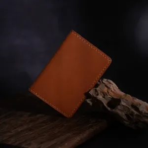 double-compartment vachetta leather card holder, minimalist style, premium italian leather, develops a beautiful patina over time