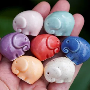 mini elephant porcelain figurine style 1, cute and whimsical mini elephant-shaped ceramic statue, perfect for decorating study or work desks