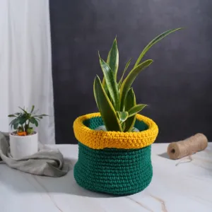 green with yellow border crochet cotton basket, unique color combination, convenient, inward-folding rim, focal point to the room