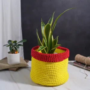 bright yellow with red border crochet cotton basket, handmade basket, vibrant color, maintains its shape, wrapping plant pots