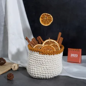 white with yellow border crochet cotton basket, warm and cozy color scheme, decorative basket for home decor, basic design