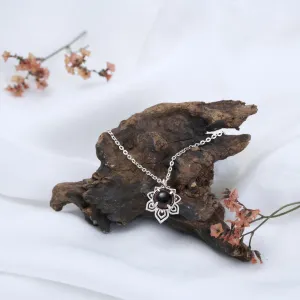 an silver necklace with garnet pendant, 925 silver and garnet stones, rust-resistant, high durability, enhances the graceful beauty