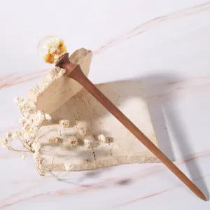 snowy resin and wooden hair stick, striking design, simple yet attractive style, natural wood color, durable material