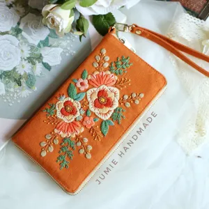 4 season hand embroidered purse, elaborate hand-embroidered patterns, convenient multi-compartment design, solid stitching