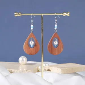big teardrop wooden earrings, elegant and luxurious design, enhances facial features, easy to match with outfits, high durability
