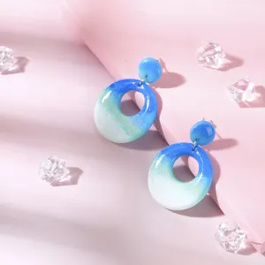circle boho clay earrings, impressively round design, bright colors, harmonious and attractive design, unique accessory