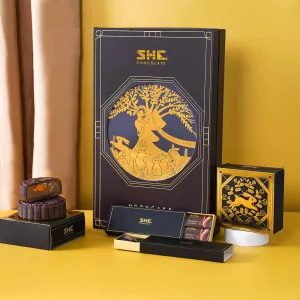 Brown Moon Palace gift box with 3 chocolate mooncakes, 12 chocolate bars & fairy tale booklet, unique corporate Mid-Autumn gift.