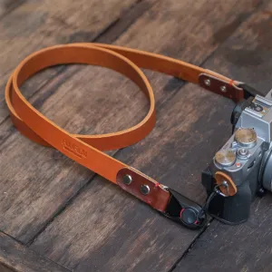 vachetta leather camera strap, flexible and durable material, rustic style, simple strap design, retro style