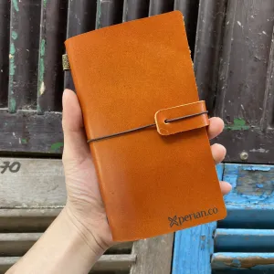 midori leather notebook, classic design, elegant color palette, luxurious leather cover material, lined paper, high-quality notebook