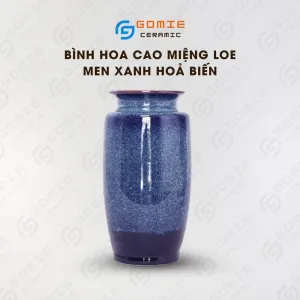 The Ocean Blue Fire-Glazed Tall Flared Ceramic Vase from Bat Trang Ceramics combines timeless and enchanting style, making it a perfect pottery vase for home decoration and an ideal housewarming gift.