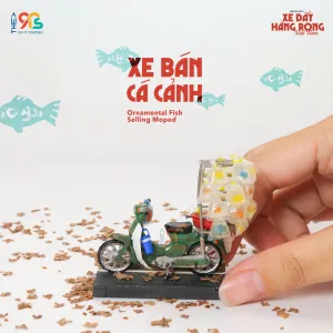 The Ornamental Fish Selling Moped Magnet is a unique piece from our Vietnam Street Cart Collection, making it a perfect Vietnamese souvenir for foreigners