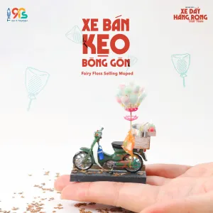 The Fairy Floss Selling Moped Magnet is a charming addition to our Vietnamese Street Cart Collection, perfect for Vietnamese decor and a unique Vietnamese souvenir.
