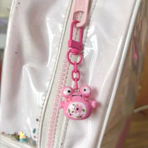 The Handmade Clay Colorful Frog Keychain boasts an adorable and charming look, making it the perfect clay bag charm, unique accessory, and lovely handmade gift, a thoughtful gift for her!