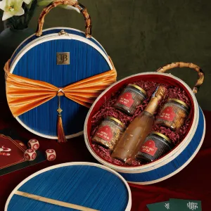 The "Blue Spring" Tet Gift Box is an elegant Tet gift basket featuring wine, nuts, and jam, making it the perfect luxury gift box for family or corporate gifts this Lunar New Year.