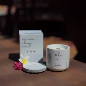 The Handmade Scented Candles in Cement Jars (Size M) showcase a raw and enchanting beauty, blending the industrial charm of concrete with the soothing aromas of premium essential oils, making them a unique birthday gift.