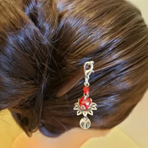 The Lotus Tassel Dangle Wooden Hair Stick enhances your hair with a touch of grace, offering a beautiful blend of traditional style and vintage charm, making it a unique gift for her