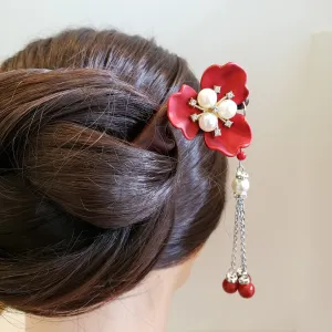 The 3-Petal Red Flower Wooden Hair Stick adds a touch of royalty and grace, making it a perfect vintage hair accessory, beautifully crafted as a handmade Vietnamese piece and an ideal unique gift for her.