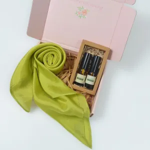The "Fragrant Season" Gift Set, featuring a silk scarf and linen spray crafted from natural ingredients, offers a serene experience and makes a thoughtful gift for her
