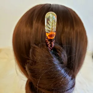 The Fern Orange Snowy Resin & Wooden Hair Stick, featuring an artistic floral arrangement, is a perfect vintage handmade hair accessory that makes a thoughtful and unique birthday gift for her