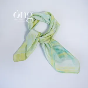 The Yellow & Green Gradient Silk Scarf, crafted from natural silk, showcases a delicate color palette and makes for an authentic Vietnamese souvenir or a thoughtful gift for her