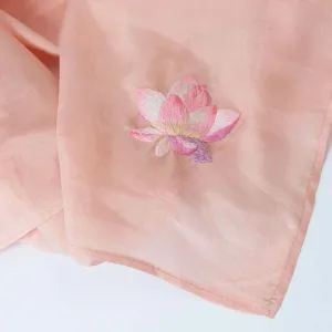 The Lotus Embroidered Silk Scarf, a cherished piece of Vietnamese beauty, is crafted from natural silk and exquisitely hand-embroidered, making it the perfect Vietnamese gift for her
