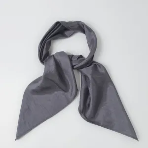 This Grey Silk Square Scarf, a traditionally woven and handcrafted Vietnamese accessory made from natural silk, offers a subtle yet luxurious look, making it a thoughtful gift for her