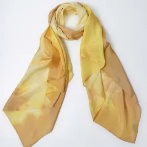 The "Earth" Silk Scarf, measuring 85x190cm and part of the Five Elements Collection, features a harmonious brown and yellow design crafted from natural silk, making it a stunning handmade accessory and a meaningful Feng Shui gift from Vietnam