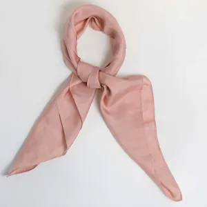 The Rose Pink Silk Scarf, handcrafted from natural silk, beautifully enhances her youthful glow, making it a timeless feminine accessory that blends tradition with elegance - an exquisite Vietnamese gift perfect for her