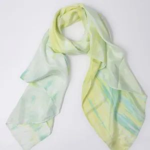 The "Wood" Silk Scarf, part of the Five Elements Collection, is an 85x190cm natural green ombre silk accessory, perfect as a Feng Shui-inspired Vietnamese gift or souvenir.