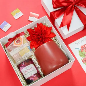 The "Passion" Gift Set is the perfect way to melt with sweet love, featuring a chocolate gift box paired with a scented candle and a cozy mug, making it a romantic Valentine’s gift and an ideal gift for her on Women’s Day