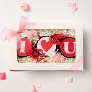 The "I Heart U" Valentine Gift Box is a heartfelt expression of love, blending delicate fragrance notes with a hidden message tucked inside a beautifully crafted scented candle, creating the perfect Valentine's gift set for your lover