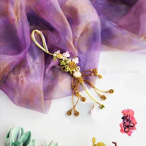 The Jade "Nhu Y" Knot Hanging Decoration is a traditional ornament that symbolizes peace and harmony, intricately crafted with a decorative knot cord to bring positive energy into any space—a meaningful Feng Shui gift and a thoughtful present for her.
