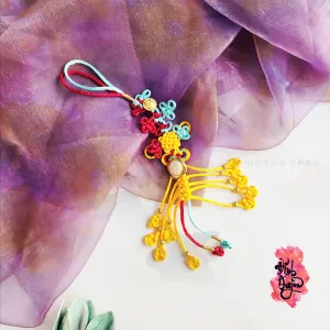 The "Nhu Y" Knot Moon Hanging Decoration is a beautiful traditional ornament that serves as a positive energy source, making it a perfect Feng Shui gift and decorative accessory for any space - an elegant and meaningful gift for her.