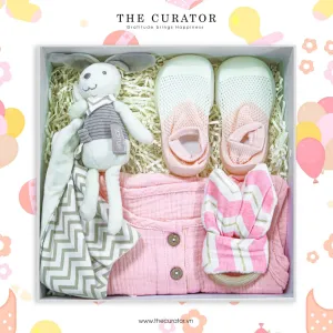 The "Baby Girl, Beautiful World Is Waiting For You" Gift Box is a heartfelt way to cherish the lovely little darling, featuring a charming gift set with adorable clothing and a cuddly toy - an ideal baby gift to celebrate her arrival