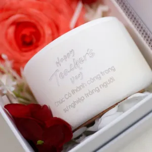 The Scented Candle in Leather Holder & Silk Scarf Gift Set is a thoughtful gift wrapped in love, featuring a scented candle with a hidden message in a personalized jar—a perfect gift for her on any special occasion.