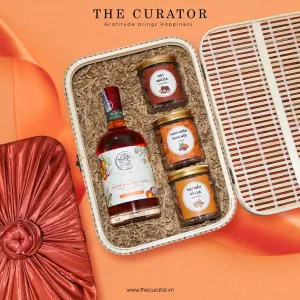 The "Prosperity & Health - Sprouted Wine" Gift Set is a Vietnamese gift that sows love through every taste, featuring a gift box with Peach Apricot Wine & Roasted Nuts - a perfect blend of flavor and tradition.