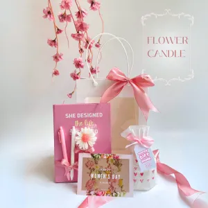 The "Flower Candle" Gift Set is a charming blind bag gift box with scented wax, a notebook, and a ballpoint pen, making it an adorable Women's Day gift for your girlfriend or any cute gift to cherish special moments
