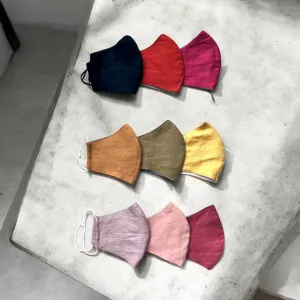 Upgrade your accessories with a Set of 7 Linen Face Masks—a colorful, eco-friendly collection featuring double-layered protection in randomly selected shades, perfect as stylish souvenirs