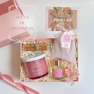 The "Scent Of Happiness" Gift Box is a romantic Women's Day surprise, featuring scented candles, essential oils, and a mystery blind bag—a thoughtful way to pour love into her life and surround her with warmth and serenity.