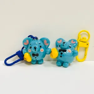 The Handmade Clay Mouse & Cheese Keychain is a cheerful companion for your everyday, a compact keychain that doubles as an adorable bag charm, making it a lovely handmade accessory to brighten up your style!
